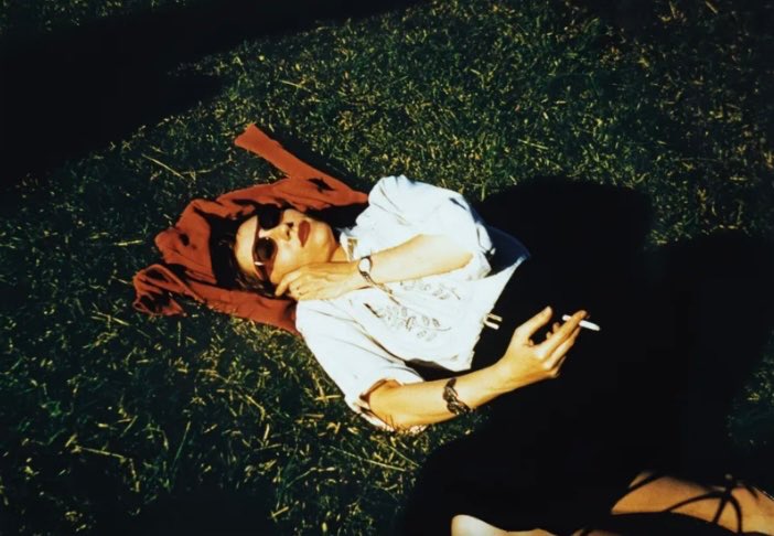 Clarice Lispector sunbathing in the 1950s.