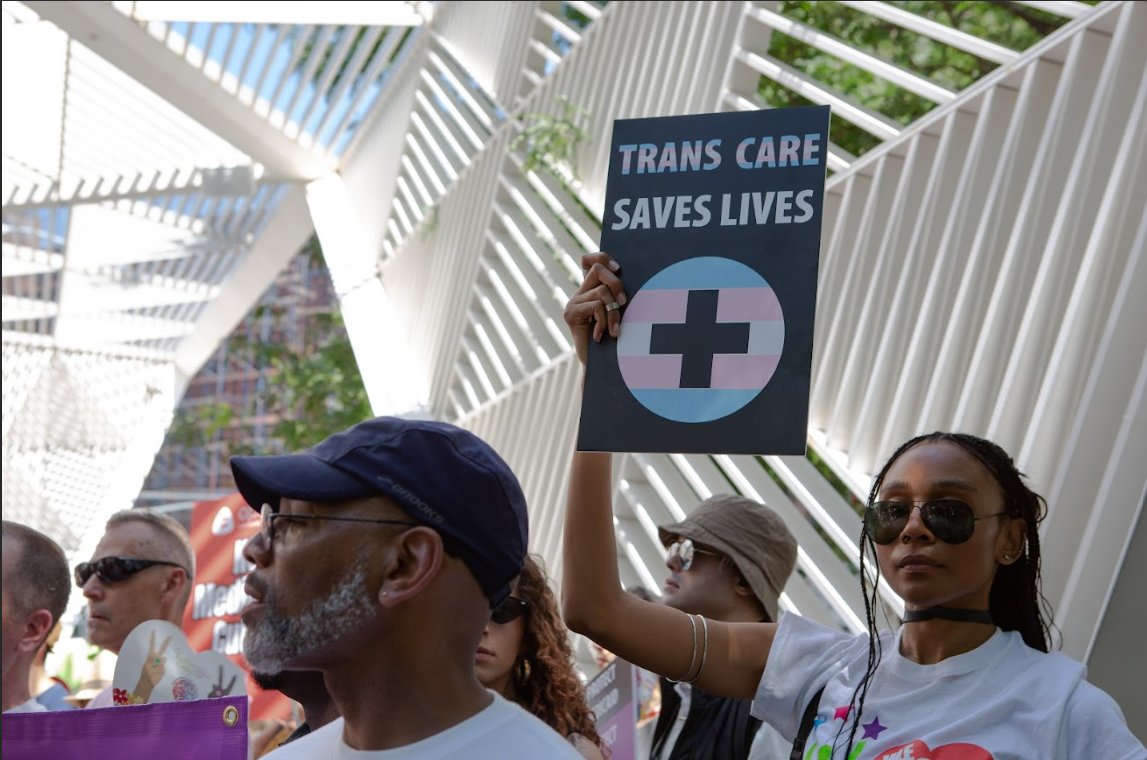 AmidaCareNY's tweet photo. Hundreds gathered at the NYC AIDS Memorial to say NO to the House’s proposed $1T Medicaid cut and ban on gender-affirming care. Just days before NYC Pride, we stood united with our partners to say:
 
We will not be erased.
 🧵⬇️
#ProtectMedicaid #PrideIsResistance https://t.co/laTHEibF4u