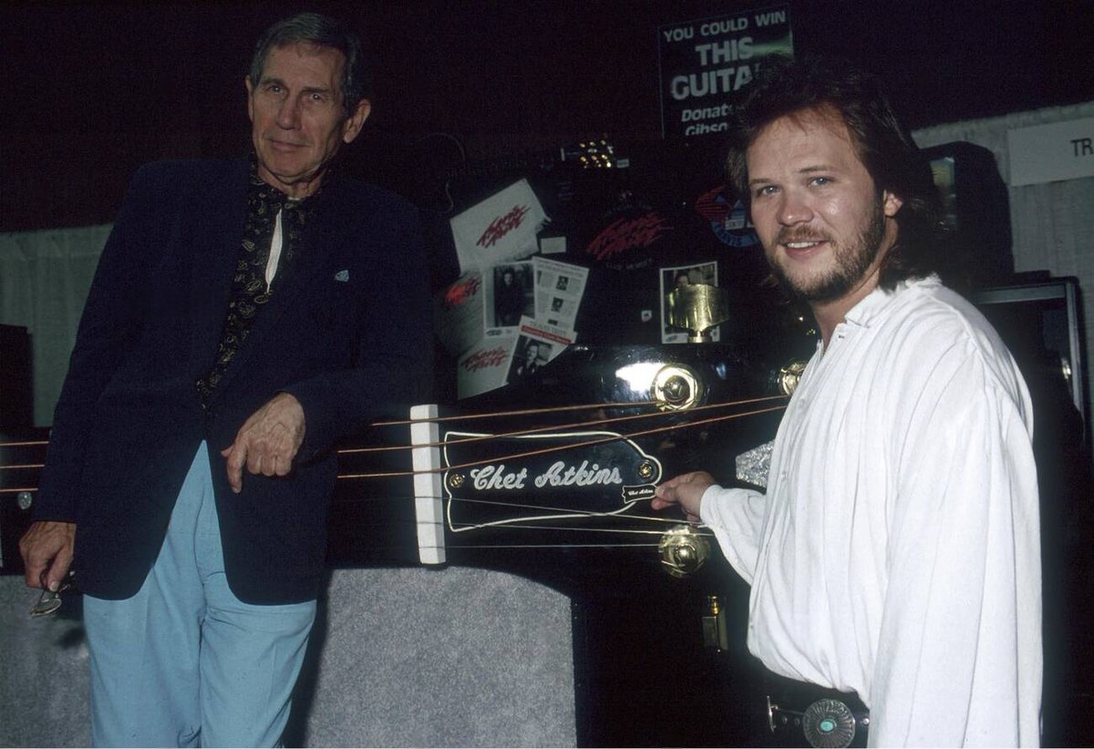 Caitlyn Bunton (@caitlynbunton) on Twitter photo Guitarist, Chet Atkins passed away on this day in 2001 at the age of 77. Here's an rare photo of Chet & <a href="/TravisTritt/">Travis Tritt</a> in 1991.
<a href="/CrRedneck123/">Carmen Lanette Ray~</a> <a href="/sheri_lynn95252/">Sheri Lynn</a> <a href="/1klmeeks/">Mrs. K Meeks</a> <a href="/Middlekens/">Joyce Coomer</a> <a href="/Angel_Wings45/">👼Angel👼</a> <a href="/rhonda_kinnaird/">Rhonda Kinnaird</a> <a href="/WhiteLorance/">Virginia White Lorance</a> <a href="/MsMimi_TCB/">Michelle</a> <a href="/KatrinaGAGirl/">MuseMe</a> <a href="/Maryway25/">Susan Burke♐️🩶</a> <a href="/Debbo_14/">Debbie Sutphin</a> Guitarist, Chet Atkins passed away on this day in 2001 at the age of 77. Here's an rare photo of Chet & <a href="/TravisTritt/">Travis Tritt</a> in 1991.
<a href="/CrRedneck123/">Carmen Lanette Ray~</a> <a href="/sheri_lynn95252/">Sheri Lynn</a> <a href="/1klmeeks/">Mrs. K Meeks</a> <a href="/Middlekens/">Joyce Coomer</a> <a href="/Angel_Wings45/">👼Angel👼</a> <a href="/rhonda_kinnaird/">Rhonda Kinnaird</a> <a href="/WhiteLorance/">Virginia White Lorance</a> <a href="/MsMimi_TCB/">Michelle</a> <a href="/KatrinaGAGirl/">MuseMe</a> <a href="/Maryway25/">Susan Burke♐️🩶</a> <a href="/Debbo_14/">Debbie Sutphin</a>