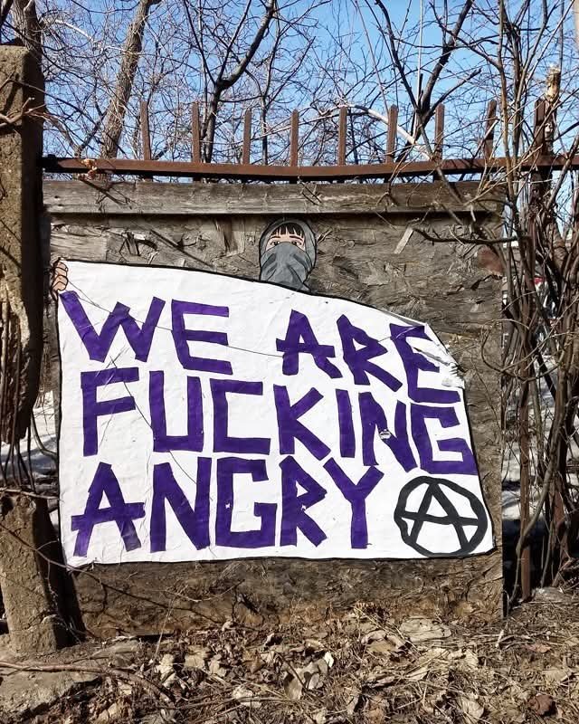 "WE ARE FUCKING ANGRY"

From the banner in London (2009)

To the sticker in Switzerland and the paste up in Montreal