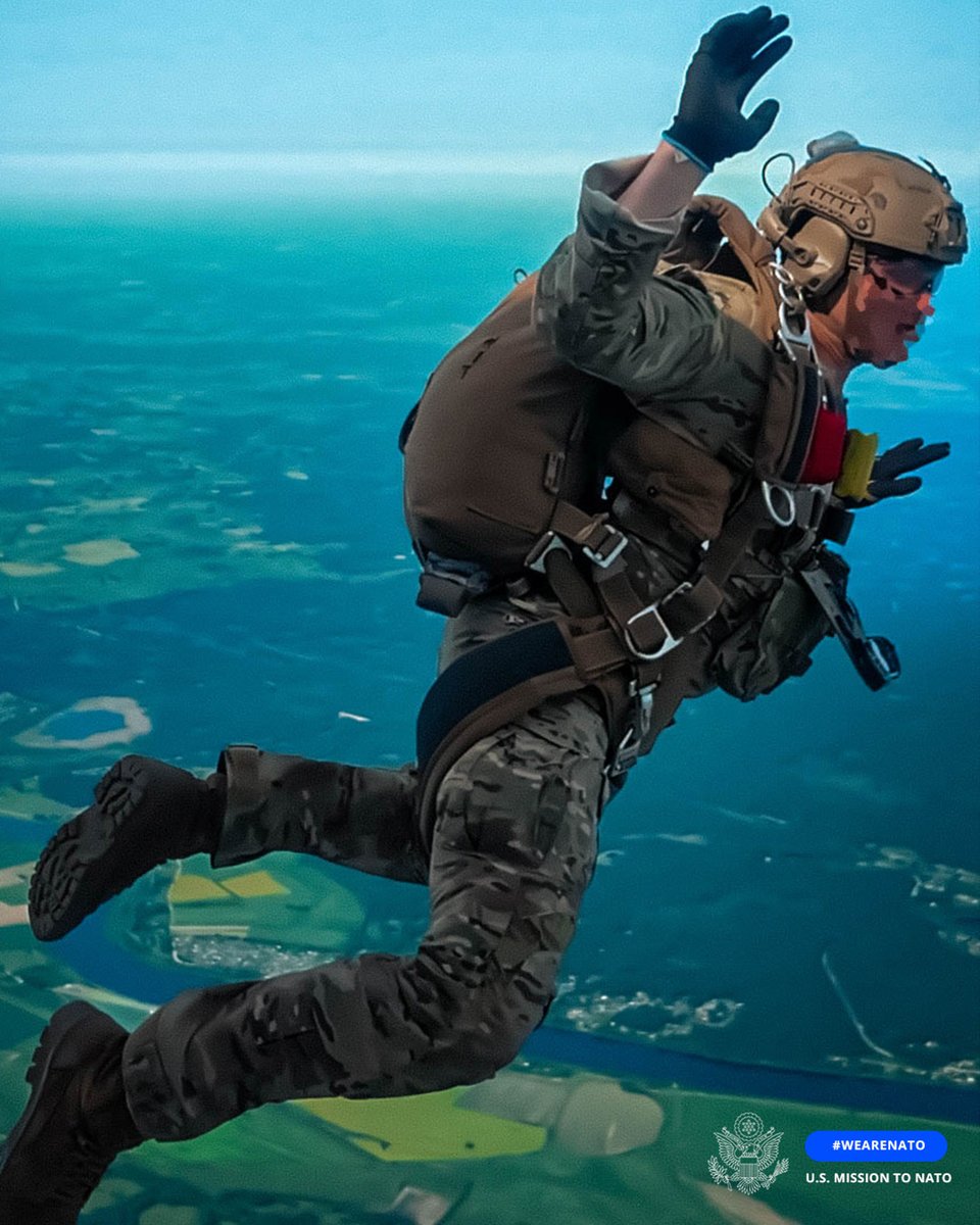 USNATO's tweet photo. In the words of Tom Petty: “And I'm free... free fallin’.”

🇺🇸 A U.S. Green Beret from the 10th Special Forces Group jumps from a UH-60 Black Hawk during a training exercise in Latvia 🇱🇻.

Another example of NATO’s commitment to stealth, precision, and readiness. #WeAreNATO https://t.co/NbpBCr4lLA