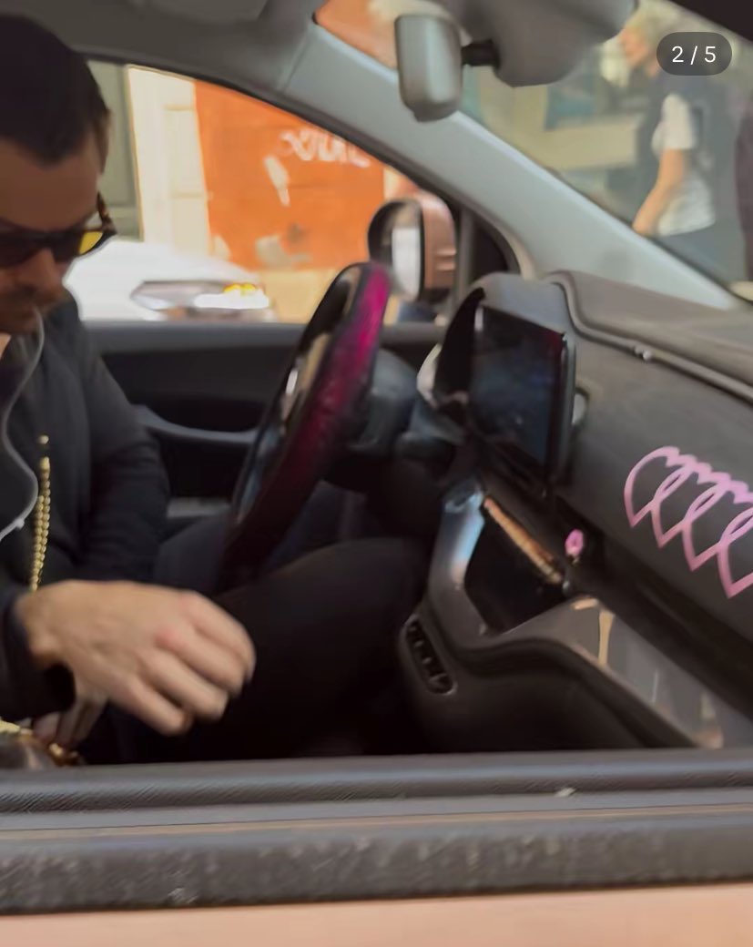 Is anyone going to talk about why the earphone bud is in his mouth???