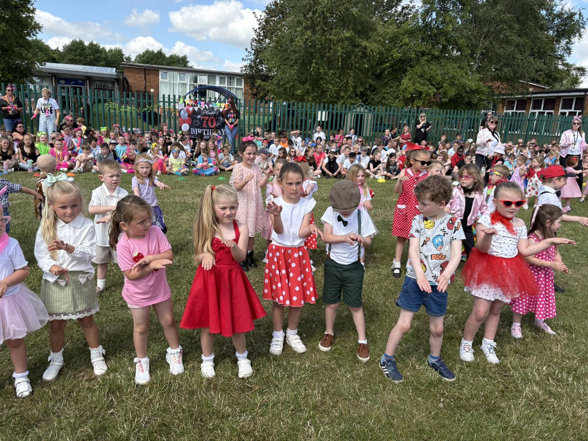 RossmereAcademy's tweet photo. What a fabulous afternoon celebrating Rossmere’s 70th birthday in style - costumes, songs and dances from each decade followed by an amazing Summer Fair. A bit hot but everyone had a great time and it was lovely to celebrate with all Rossmere families. @extoltrust https://t.co/TLNRkefNYX