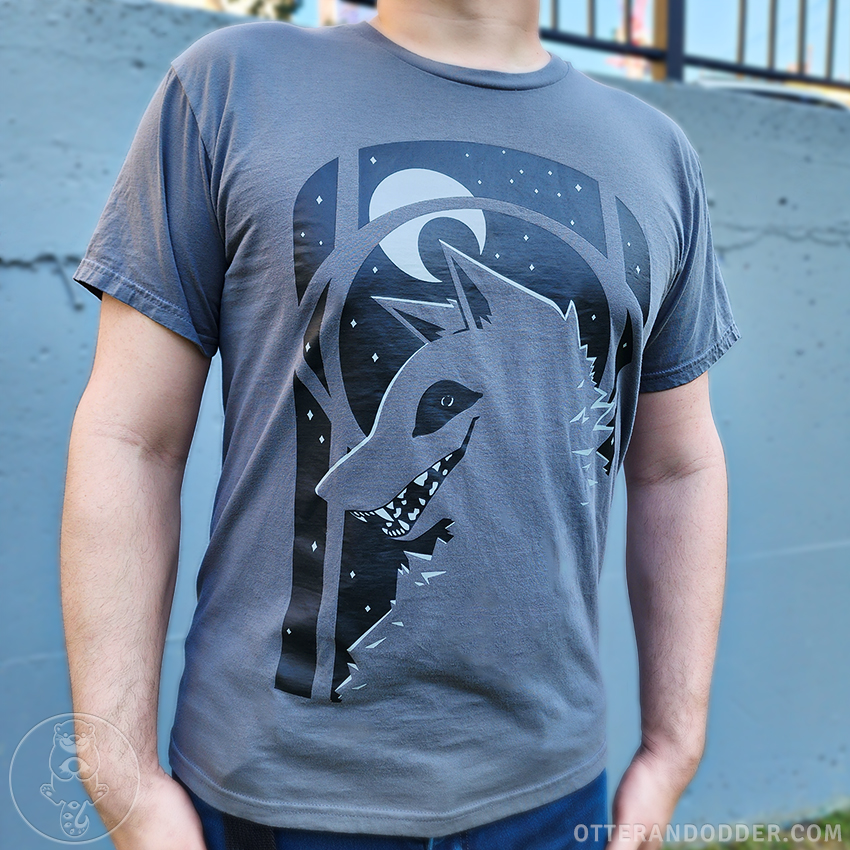 The fourth and final new shirt design launching next week at Anthrocon, Moonlight Grin! 🐺🌙🦷