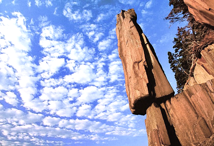 geologyBits's tweet photo. In Geology ✔️ Mineralogy - Botany
#BalancingRock #NovaScotiaGeology #DigbyNeck #CoastalErosion
🔁 Balancing Rock: Nova Scotia’s Gravity-Defying Wonder
▶️ Perched precariously on a cliff’s edge, the Balancing Rock of Digby, Nova Scotia, defies logic and time, standing tall against the relentless tides of St. Mary’s Bay.
How does this 9-meter basalt column endure?
Formation Story
Over 200 million years ago, during the breakup of Pangea, volcanic activity along Nova Scotia’s North Mountain formed vast basalt lava flows.
As these cooled
they fractured into vertical polygonal columns, including the iconic Balancing Rock on Long Island.
Centuries of wind, waves
and tidal erosion sculpted this column, eroding softer surrounding rock while leaving the resilient basalt standing, balanced on a narrow base, seemingly defying gravity.
Geological Information
The Balancing Rock, a columnar basalt formation, is part of the Jurassic North Mountain Basalt, a volcanic ridge extending along Digby Neck and Long Island.
This hard, dense rock
composed primarily of plagioclase feldspar and pyroxene, formed from rapidly cooling lava, creating hexagonal columns typical of basalt formations worldwide, like the Giant’s Causeway.
The rock
approximately 9 meters tall and weighing over 20 tons, is anchored by a small contact point, with two narrow sections connecting it to the bedrock, allowing it to withstand erosion and even historical attempts by fishermen to topple it with boat.
The surrounding cliffs
shaped by the Bay of Fundy’s extreme tides, reveal similar collapsed columns, highlighting the relentless erosional forces at work.
▶️ Interesting Fact
Despite its precarious appearance, the Balancing Rock has stood for thousands of years, resisting both natural forces and human efforts to dislodge it, including attempts by fishermen using boats in the past, testament to its remarkable stability.
Have you hiked the 2.5 km trail to see Balancing Rock in person?
🔁 Like & Share your experience or other favorite geological wonders you’ve visited!
🎞️ The famous Balancing Rock in Nova Scotia Canada
https://t.co/auuu592BXT