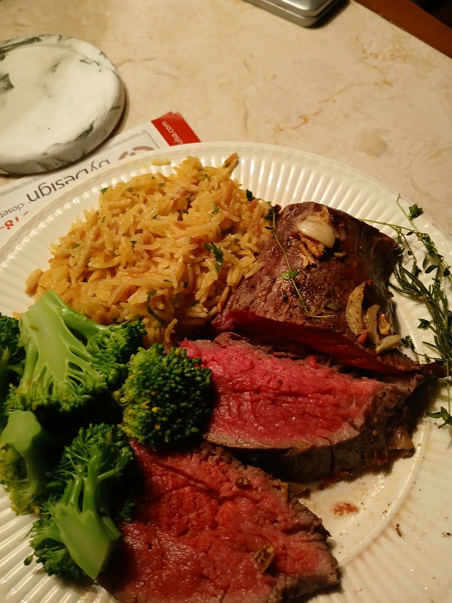 Reverse seared medium rare beef tenderloin homemade rice pilaf lemon broccoli
