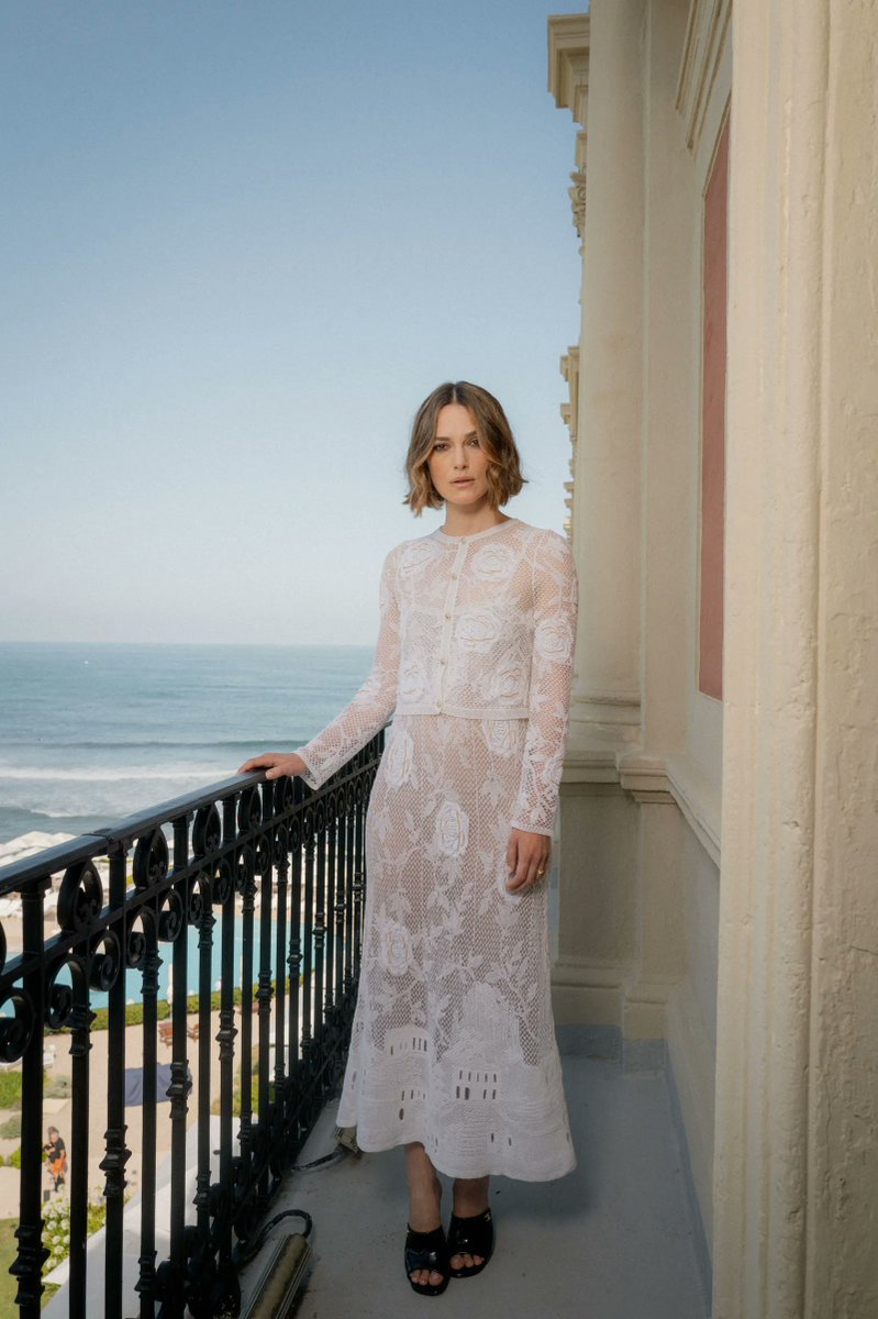 Keira Knightley at Biarritz Film Festival in a romantic white crochet  co-ord set from Chanel's Resort 2026 collection, adding another chic look  to her iconic style repertoire!