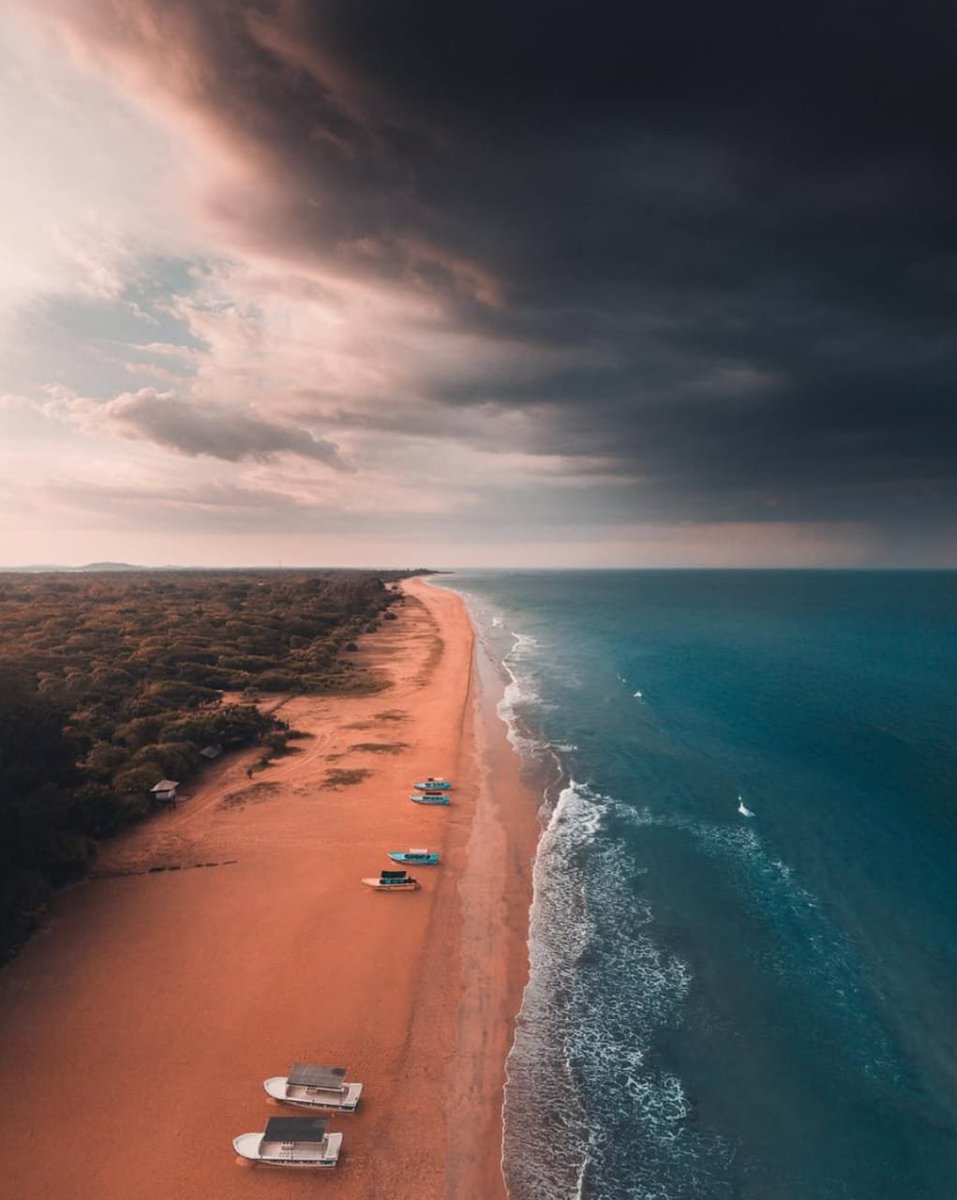 Where the golden sands meet the moody skies and the ocean whispers stories 🌊⛅
This coastline is pure drama and beauty in one frame.

📍 Location: Kalpitiya Peninsula, Sri Lanka
📸 Credit: <a href="/alex_stead/">Alex Stead</a>

#SriLanka #CoastalViews #BeachVibes #Kalpitiya #DronePhotography