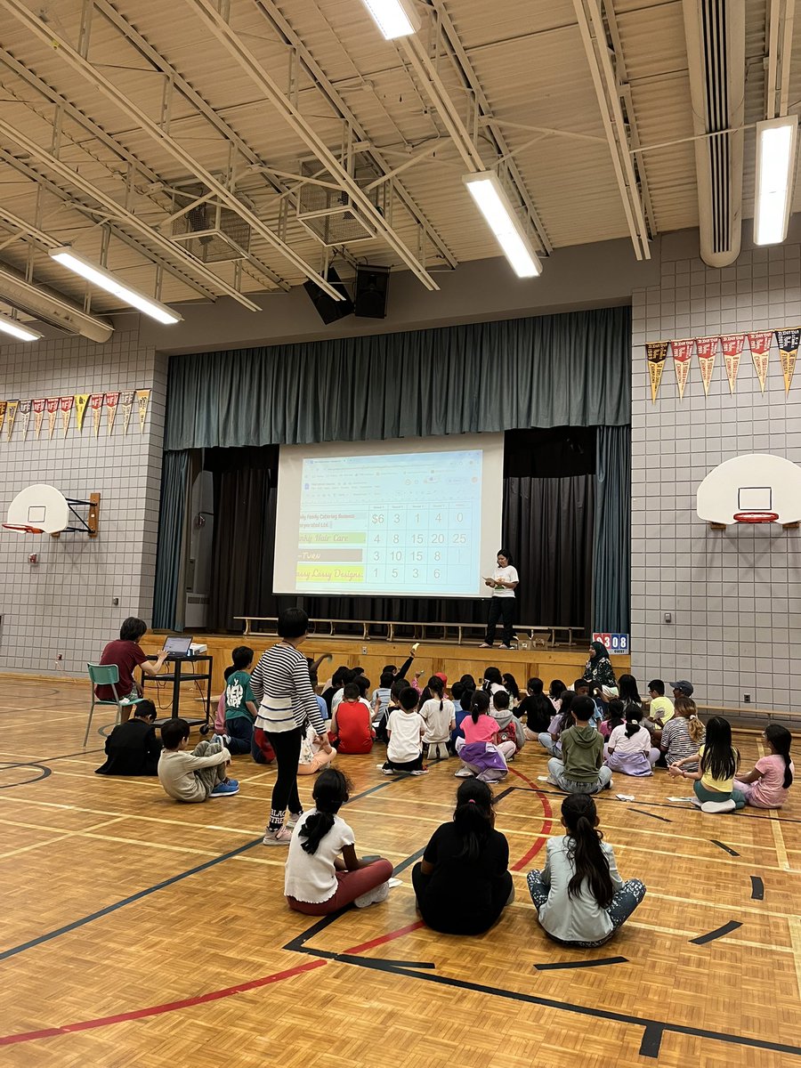 Buying and selling stocks 
What a busy Wall Street at Macklin!
Grade 3 students in Ms. Lim, Ms. Bandi, and Mr. Kwan’s class had a great opportunity to explore financial literacy in a real life scenario. Thanks to our Grade 8 students for helping out in this event!👏