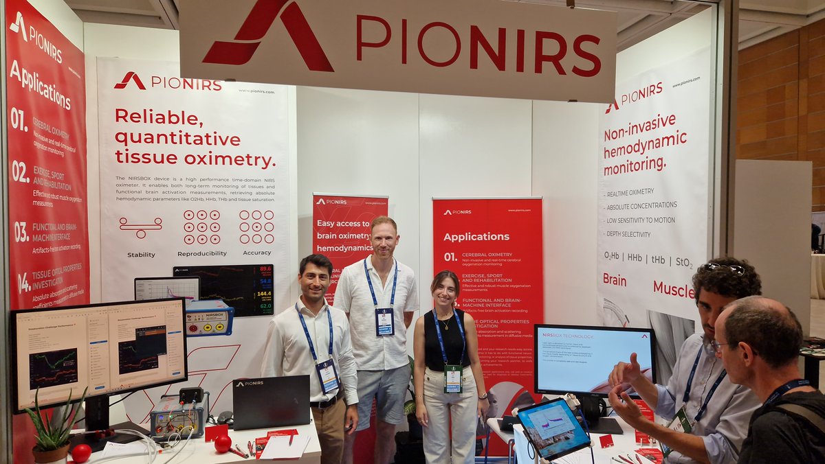 Chris McManus visiting the Artinis and PIONIRS stands at ECSS. mNIRS for sport!