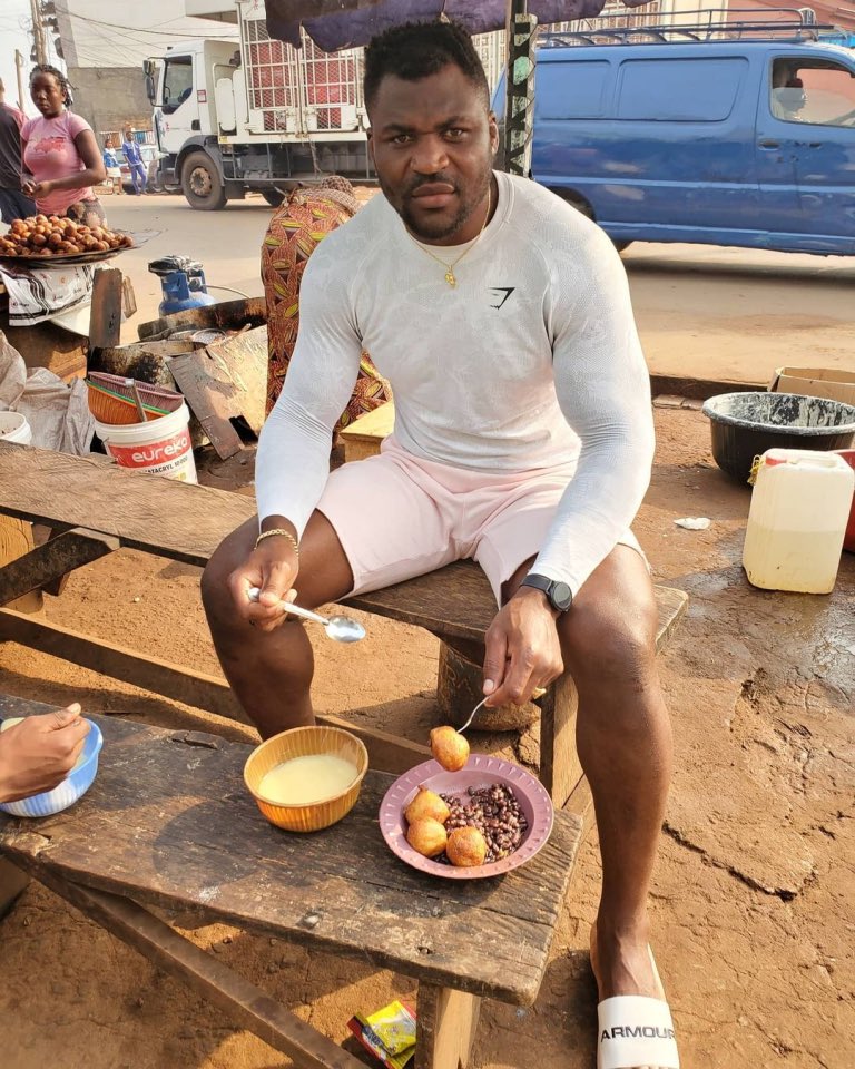 Former UFC and current PLF Heavyweight Champion Francis Ngannou enjoying local delicacies back in Cameroon.