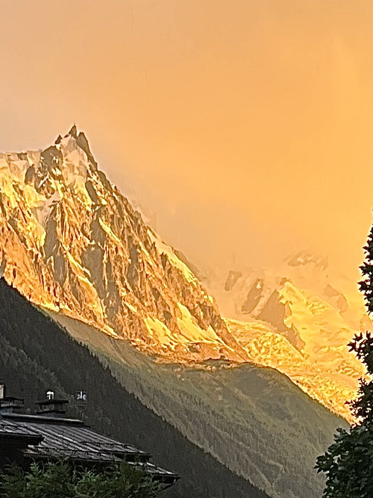 guidemark's tweet image. Strange weather giving a weird sunset over the Chamonix Aiguilles.