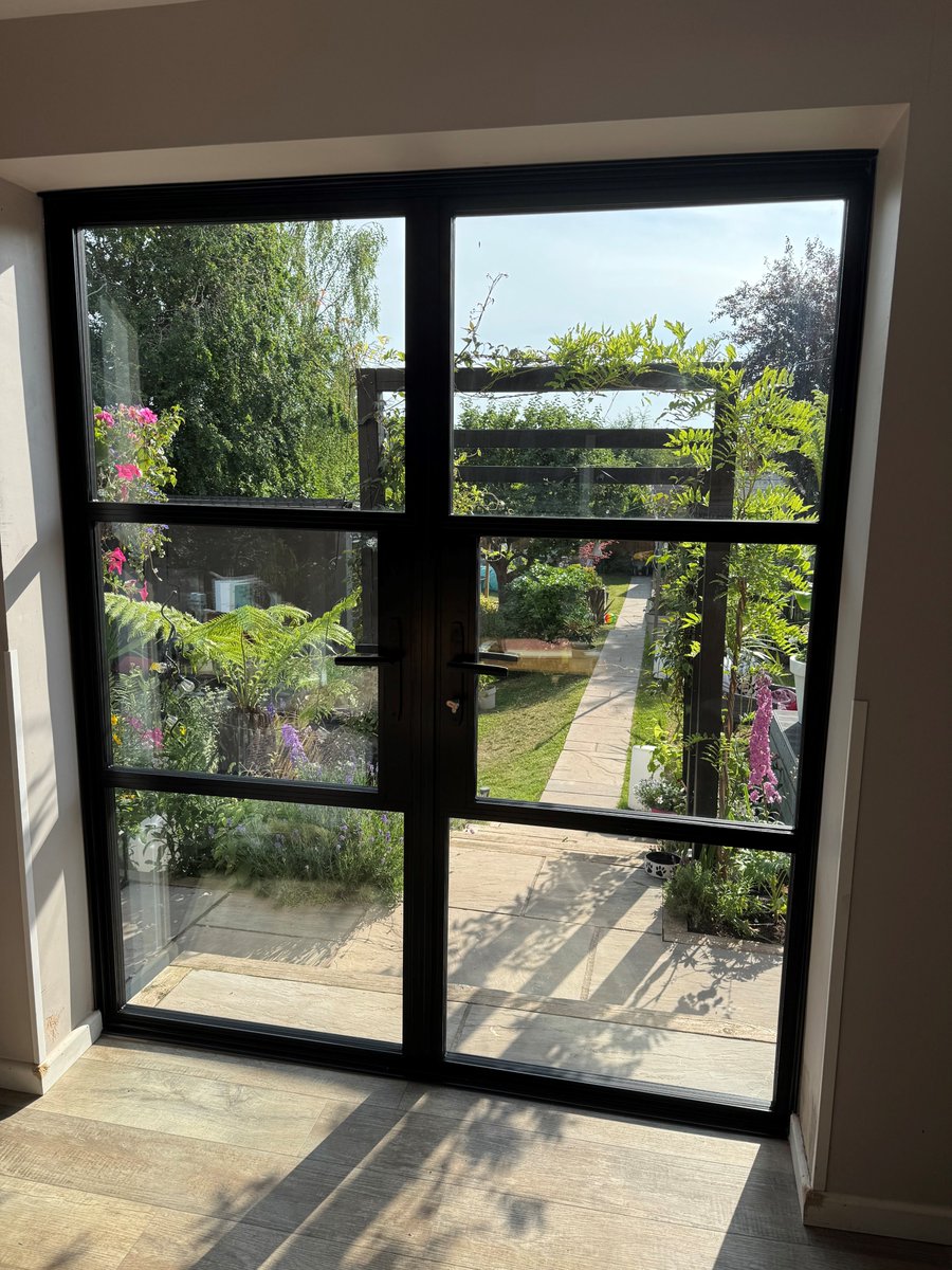 Huge thanks to our customer for sharing this gorgeous shot of their new aluminium French doors! 

Slim frames, big glass panels &amp; a garden view to die for 🌿☀️

#AluminiumDoors #HomeGoals #worcestershirehour