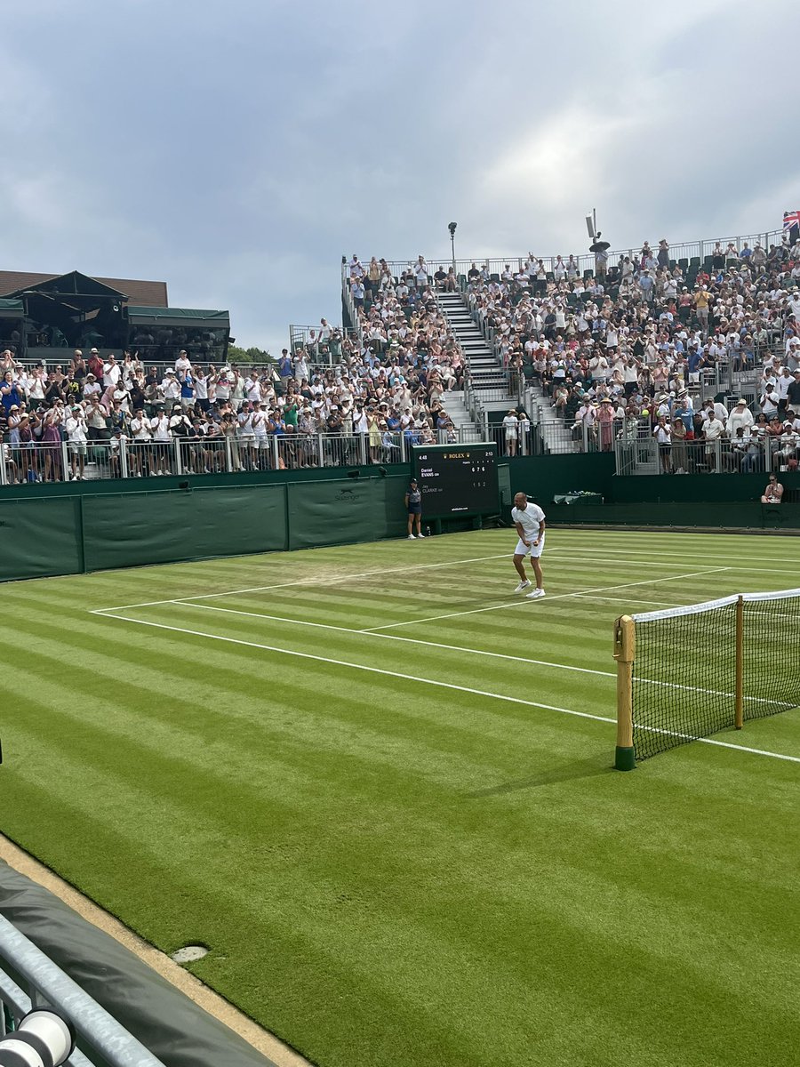 Dan Evans celebrates as he becomes the first British man through on day two of Wimbledon.

His first win here in four years.

#Wimbledon