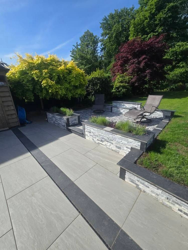 A Stunning Garden Transformation for #TransformationTuesday 💫 

Eezee Timber &amp; Landscape Solutions have only gone and smashed it again with this garden glow-up!

They’ve used our Silver Kandla Grey Porcelain 900x600 for the patio, Cloudy Grey Cladding and Noir Black 900x200.
