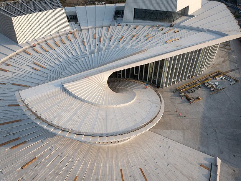 new photographs show <a href="/snohetta/">Snøhetta</a>'s shanghai grand opera house take shape 📸 designboom.com/architecture/p…
