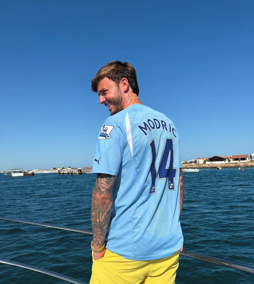 Got a tattoo of the trophy and walking round in a Modric shirt. How can you not love this bloke