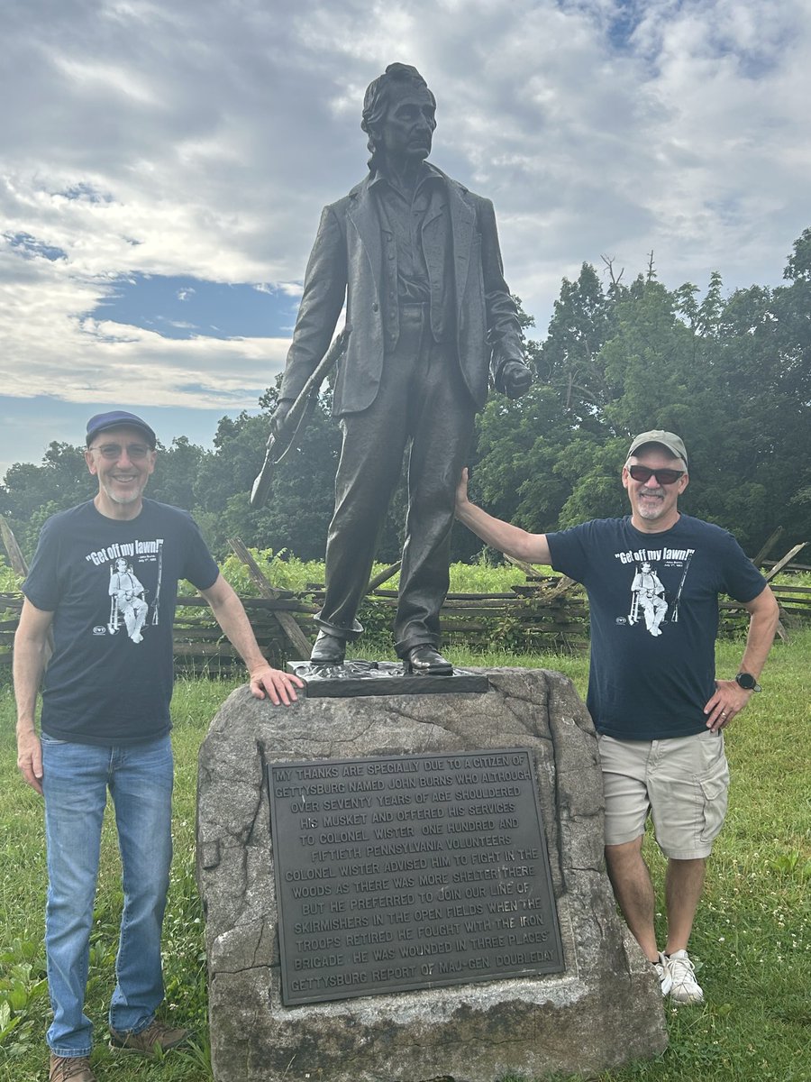 TomMcMillan63's tweet image. Podcast partner John Banks and I honoring the curmudgeonly citizen-hero of Gettysburg, John Burns, on the 162nd anniversary of the battle. At age 69, local resident Burns grabbed his musket and told the Confederates, “Get Off My Lawn.”