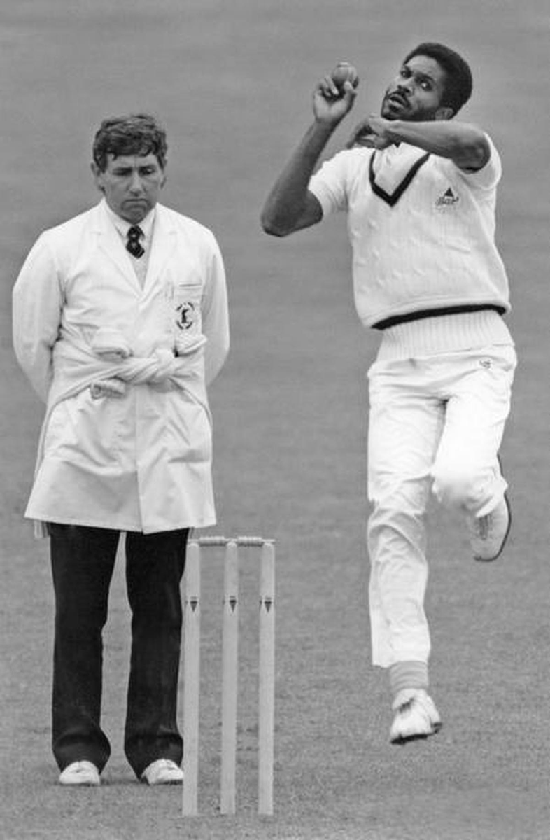 MBESportHQ's tweet photo. "Whispering Death" strikes fear! 🏏 Michael Holding, a West Indies legend, terrorized batsmen with 249 Test wickets! 💨 Remember the 1981 Boycott over? 🔥 Holding's name echoes in cricket history! #MichaelHolding #Cricket #WestIndiesCricket #MBESportHQ https://t.co/UvAyznZNL0