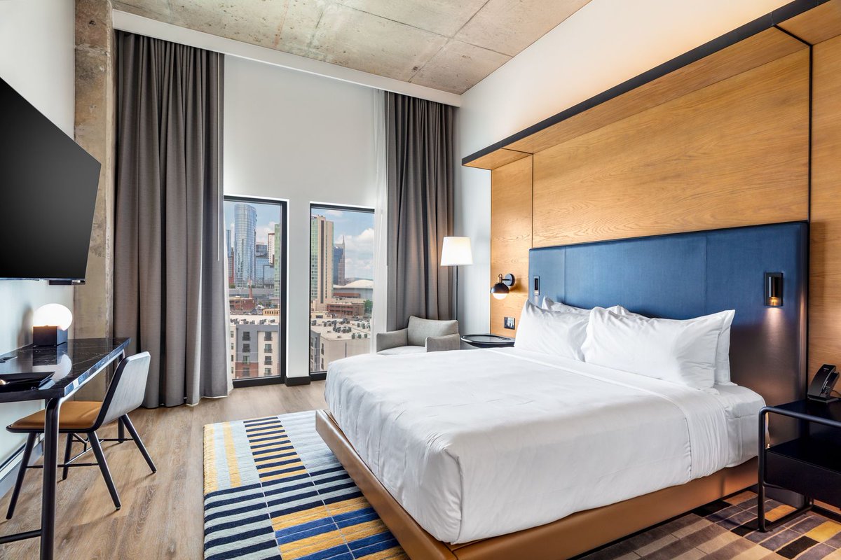 The Hilton Canopy and Homewood Suites dual-branded hotel is complete! The 325,000 SF project features two 11-story towers with a single-level, below-grade valet parking garage. The hotel features 334 guestrooms, 2,500 SF of retail, two bars, a cafe, and an outdoor terrace.