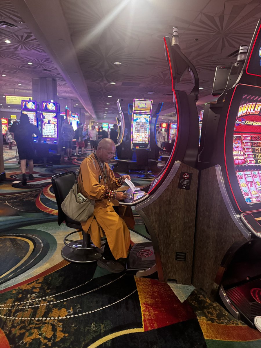 After a long day of selling bracelets and blessings, even a monk needs to unwind—one max bet at a time
