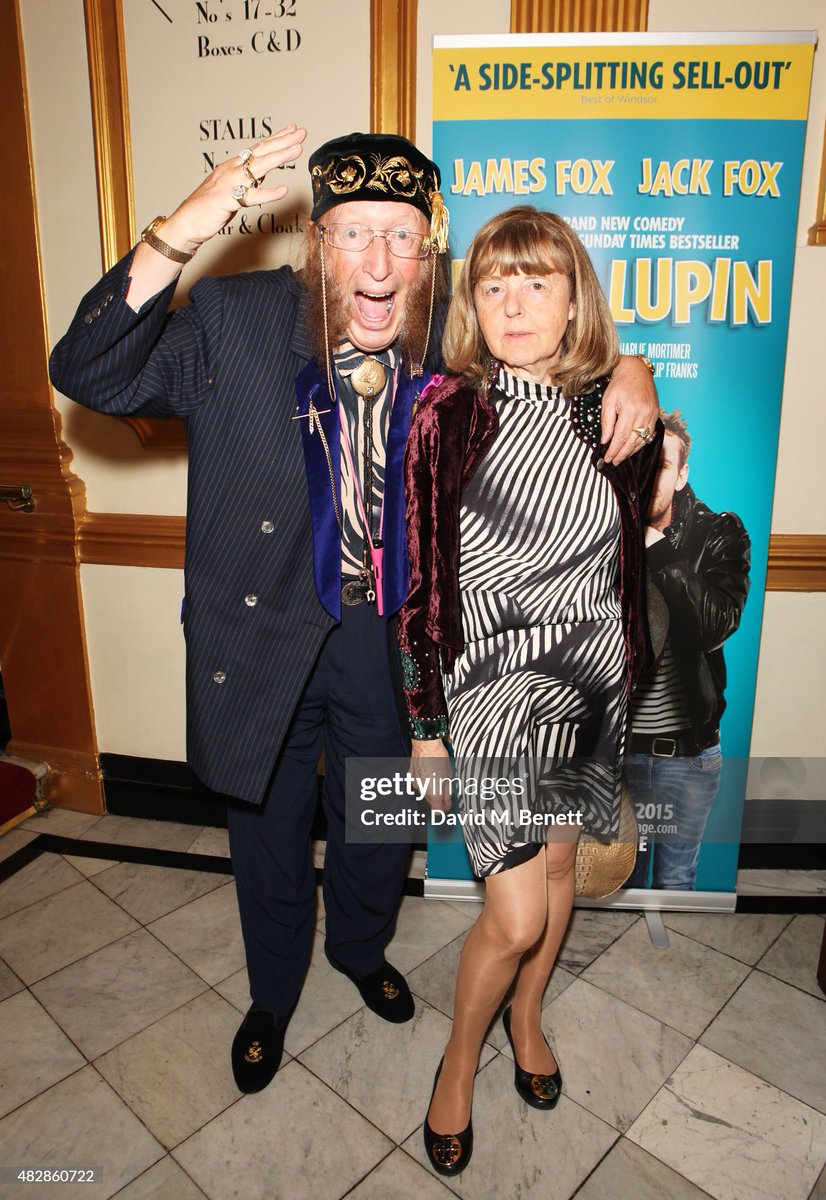 shitbritishpics's tweet image. John McCririck (L) and wife Booby arrive for the press night performance of "Dear Lupin" at The Apollo Theatre on August 3, 2015 in London, England. (2015)