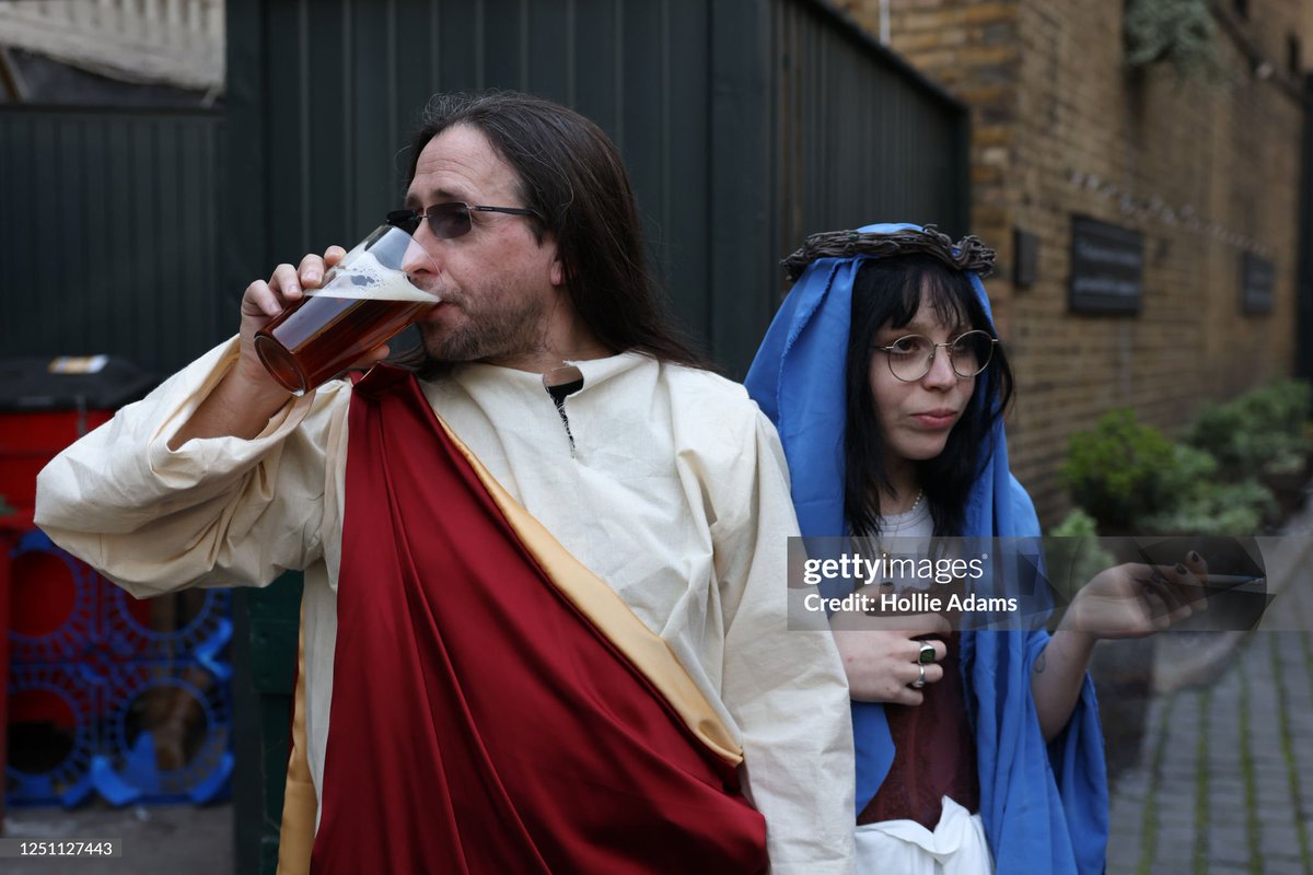 shitbritishpics's tweet image. : People dressed as Jesus and Mary participate in the Christathon pub crawl on April 9, 2023 in London, England. The Crucifixion-themed pub crawl started at The Trinity pub in Borough and was scheduled to finish at Whitehall's Silver Cross (2023)