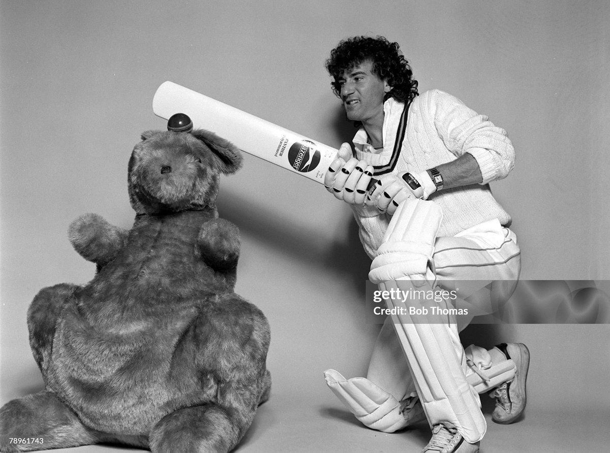 shitbritishpics's tweet image. Liverpool's Australian footballer Craig Johnston, dressed in cricket whites attempts to bat the ball off a toy kangaroo's head (1982)