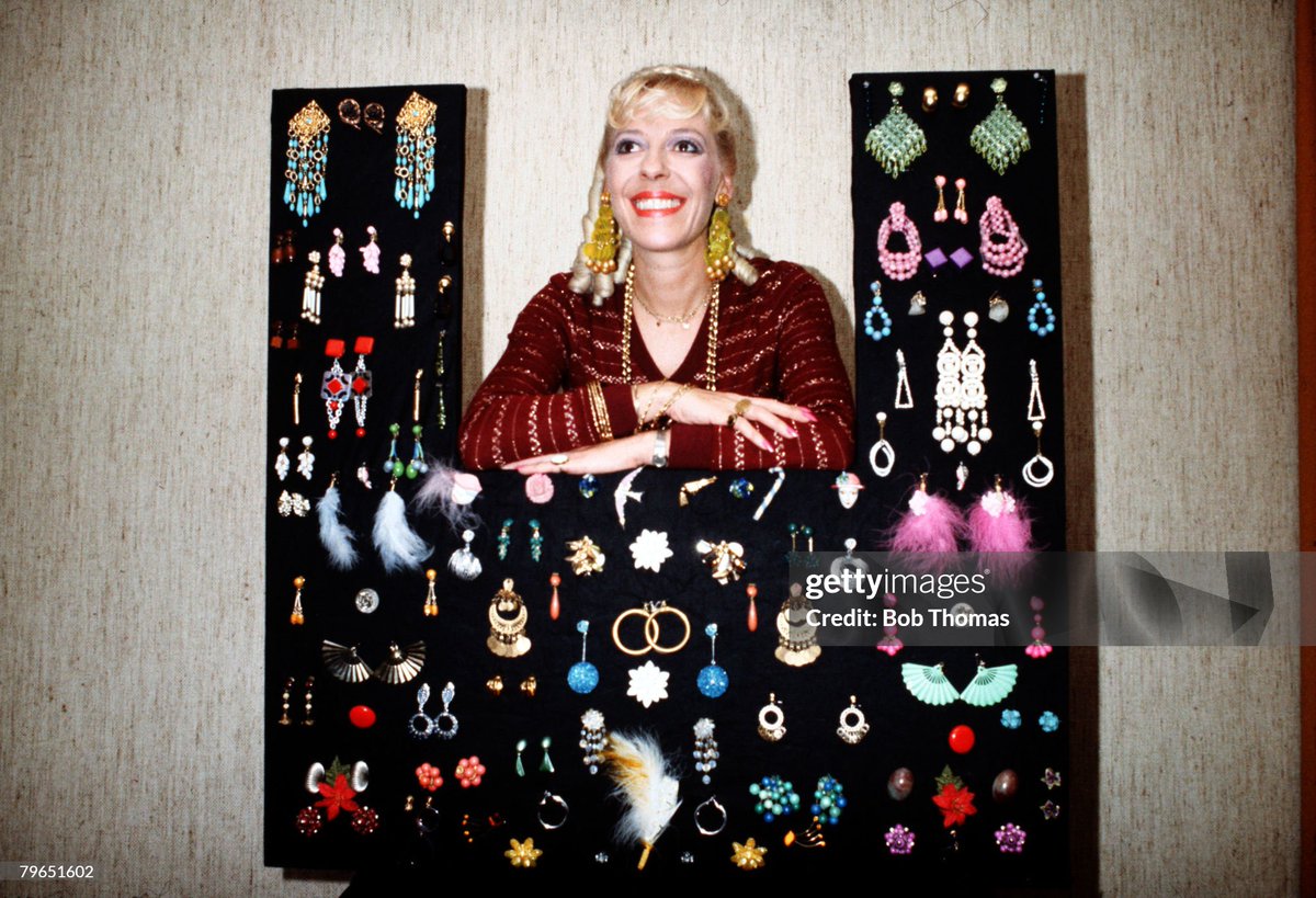shitbritishpics's tweet image. England, Circa 1970's, Actress Julie Goodyear who plays the role of Bet Lynch in the television series "Coronation Street" is pictured with her vast collection of earrings