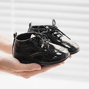 SundaeGrrl404's tweet image. Looks like he mugged a toddler at a funeral and stole his shoes.