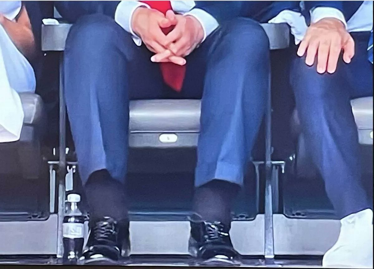 SundaeGrrl404's tweet image. Looks like he mugged a toddler at a funeral and stole his shoes.