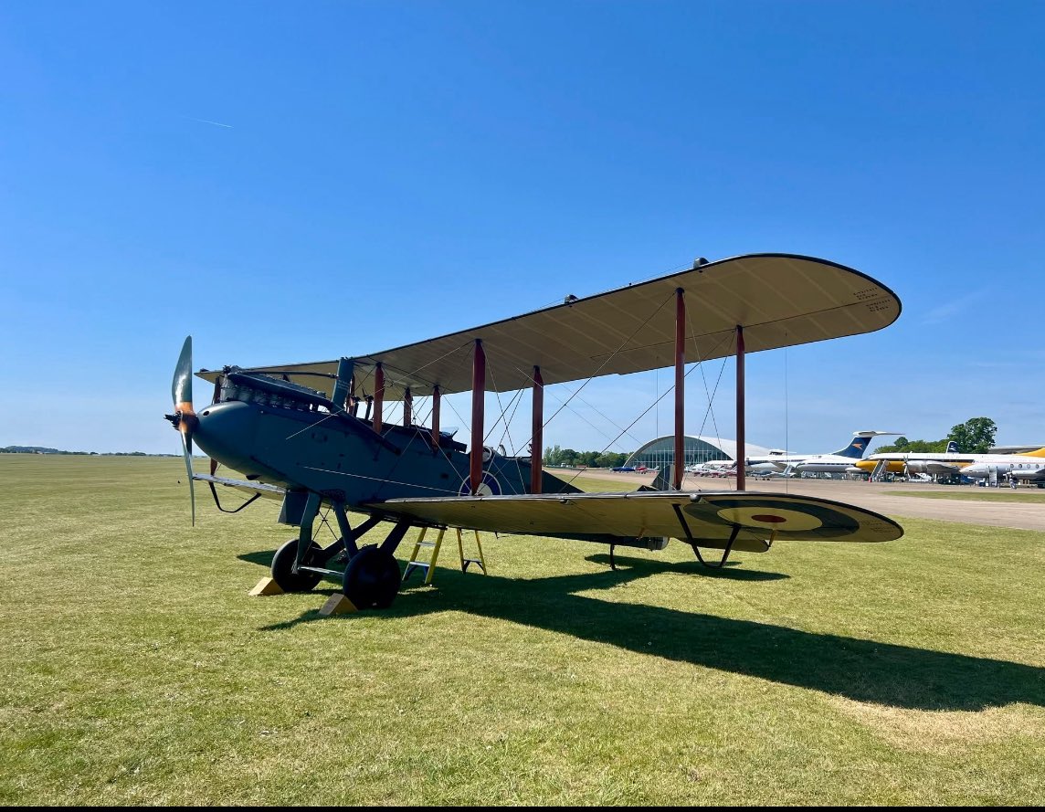 1940Andy's tweet image. Here is ‘my’ DH9 looking fabulous in the Duxford sunshine. Can’t quite register that it was 25 years ago that I hauled this aircraft, and the IWM static example, out of a Rajasthan elephant stable.