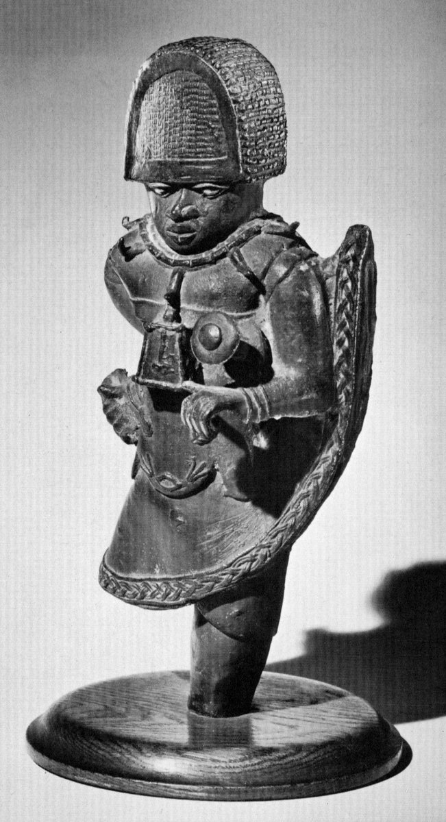 A cast figure of a warrior from the Benin Kingdom, 16-18th Century, from what is now Nigeria
