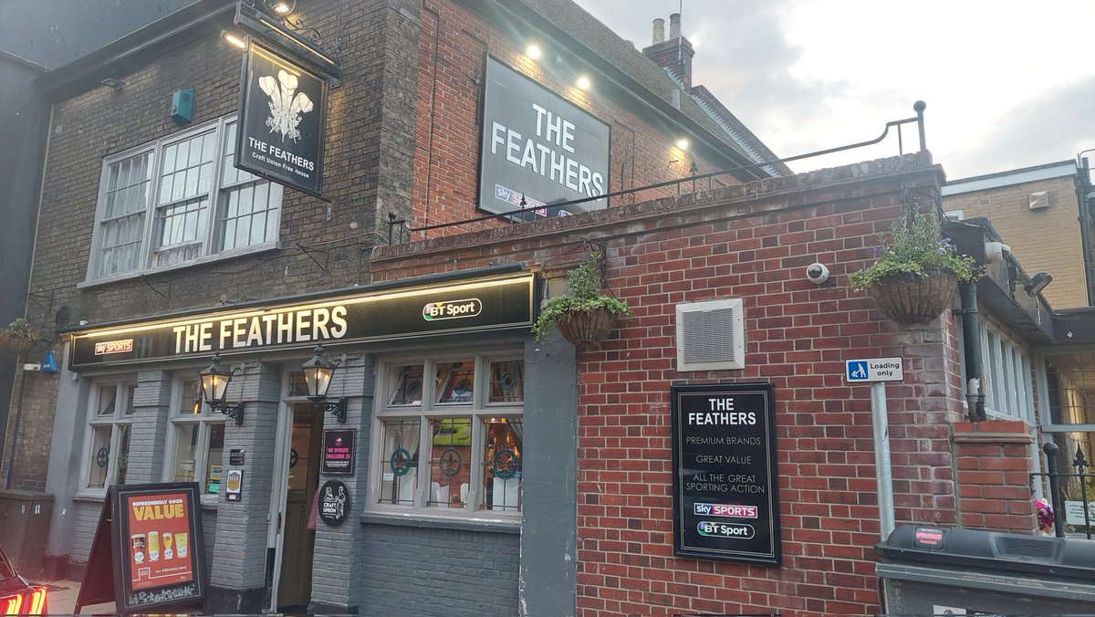 The Feathers, Great Yarmouth. Two mainstream cask ales on. Craft Union pub down a small side street on it's own, but very close to the central bus depot. TV screens for the sport.