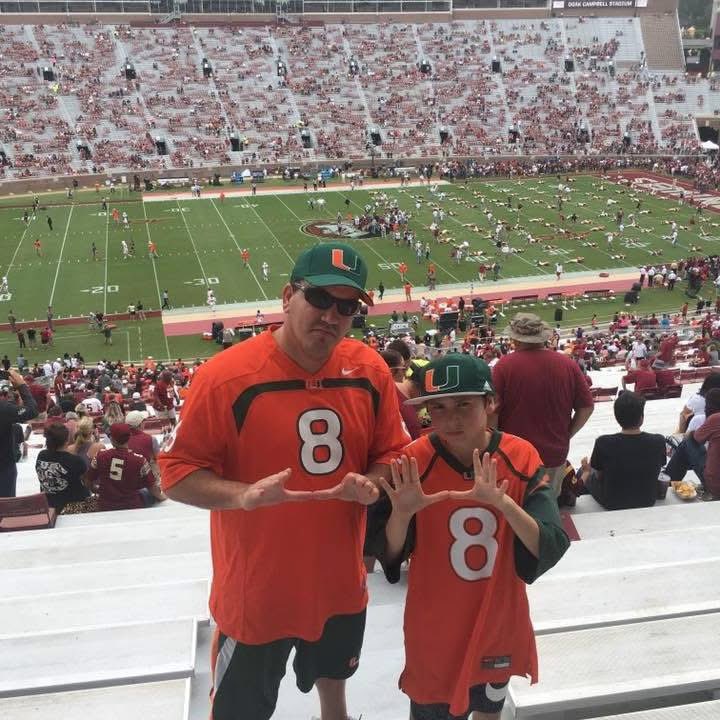 mtag1993's tweet photo. I was there and took my son to his first Canes game! No better way to rip their hearts out! #gocanes #throwbacktalk https://t.co/etGWl3U2Rl