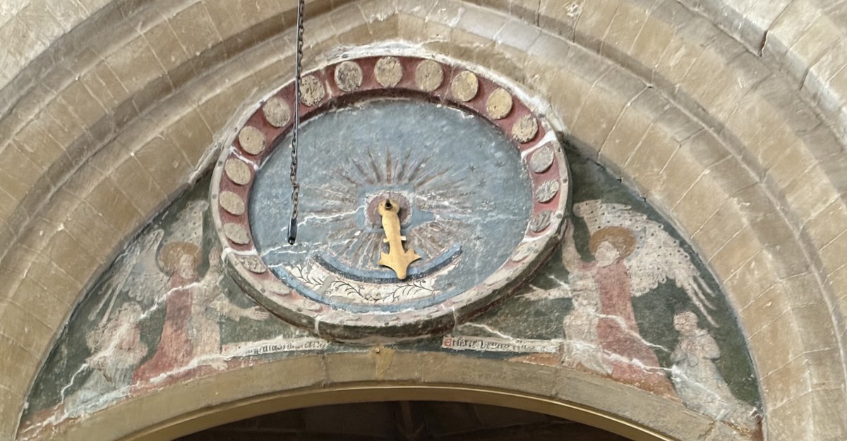 Back to Raunds.  The earliest example of a 24 hour clock that I have seen.  Painted around 1420 this clock face shows 24 dots that mark the hours flanked by angels, the kneeling donors and a Latin inscription asking us to pray for them.