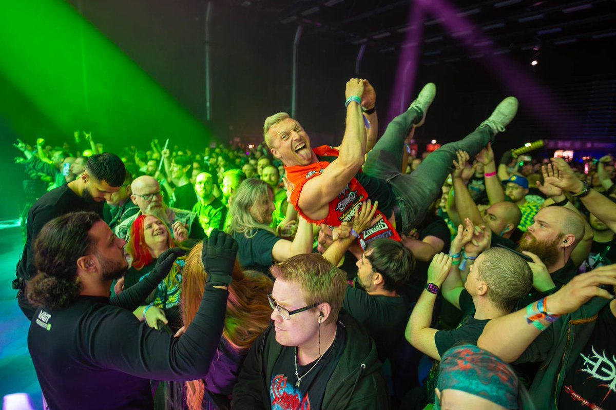 JohnOberg's tweet image. This might surprise you, but I do have interests outside of animal advocacy. 😂 Here is a fun pic of me recently crowdsurfing at a metal show. 🤘