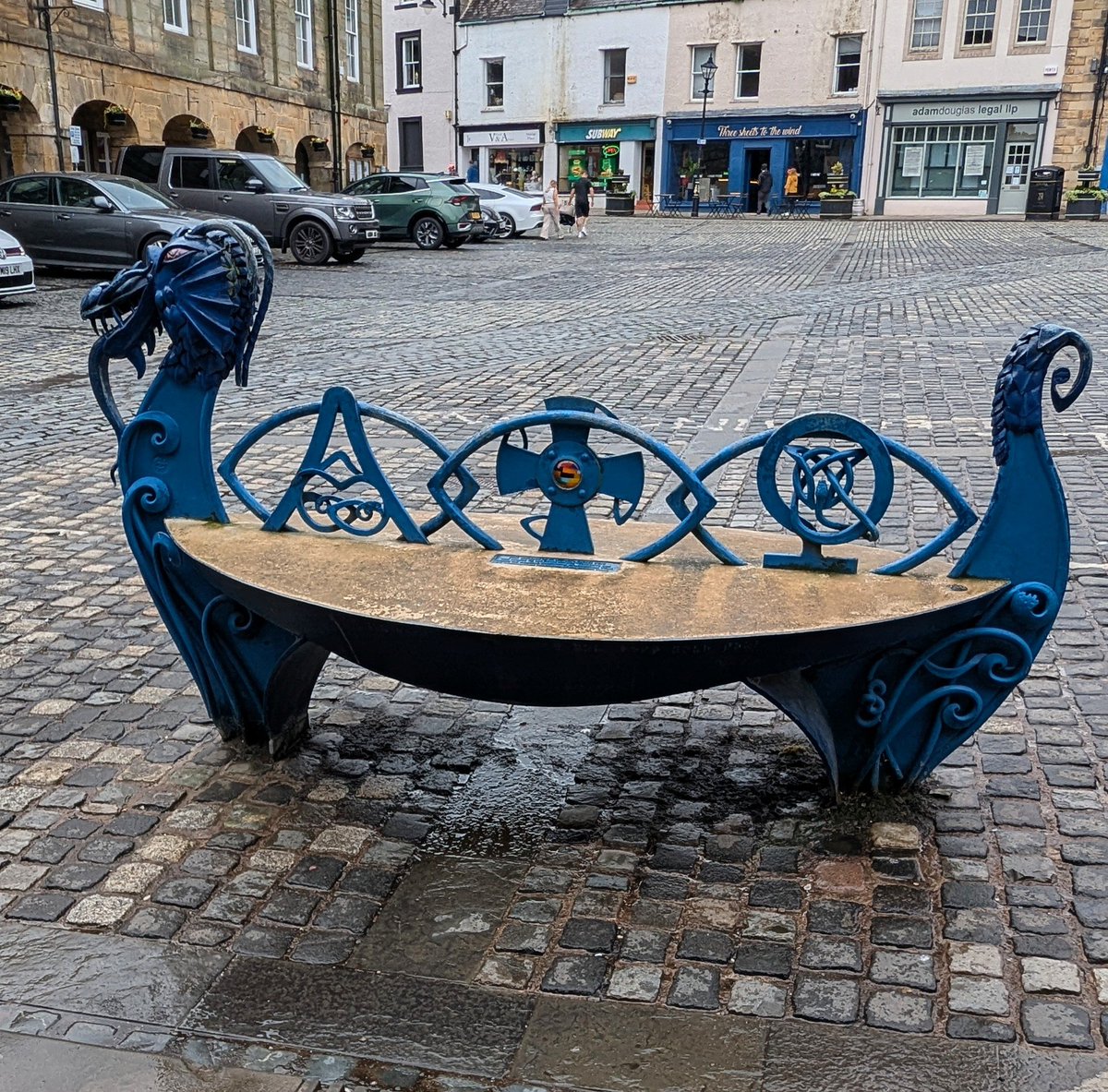A very wild Viking bench in Alnwick Market place, Northumberland, England