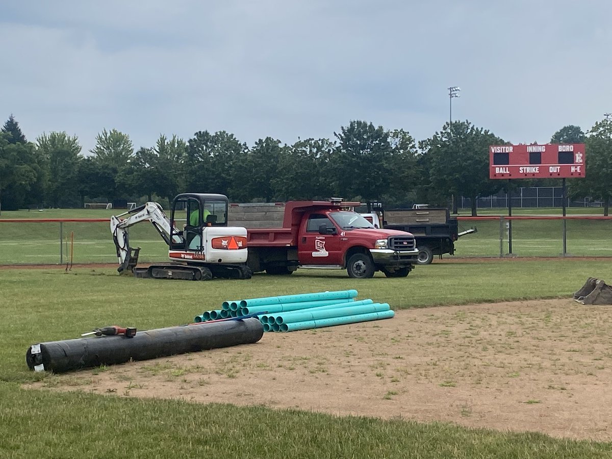 New drainage tile on the softball field !!!