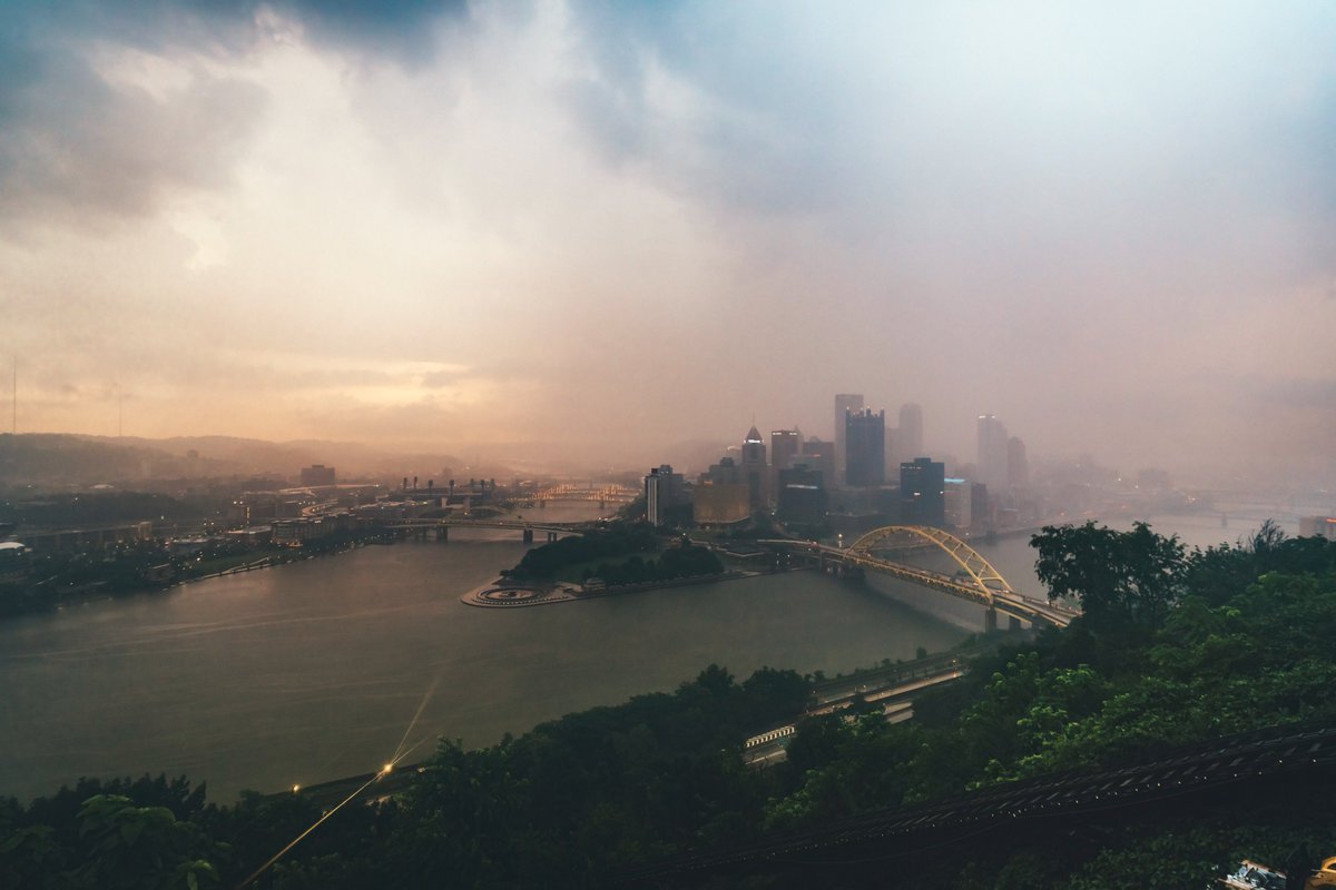 DaveDiCello's tweet image. I was originally hoping for a colorful sunrise in #Pittsburgh this morning, but that wild rain shower that appeared out of nowhere had other plans. Still, it was cool to see the sky lighting up behind the rain as it moved through.