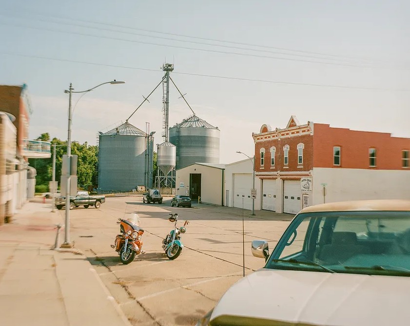 CaseyBHead's tweet image. Mid-July makes me think about the summer I turned 19 working on a crew spraying ditches on country roads up to 100 hours a week and every little northern Iowa town looked just like this.
