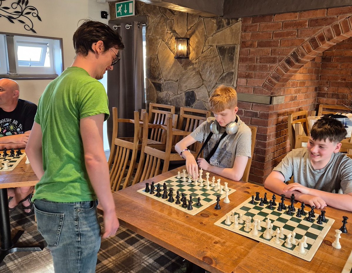 MaDDChess's tweet image. Last Thursday we hosted the formidable Greg Eagleton for a simul vs 20 players. He won 15-5, but well done to the four players of ours who scored wins against him! #chess