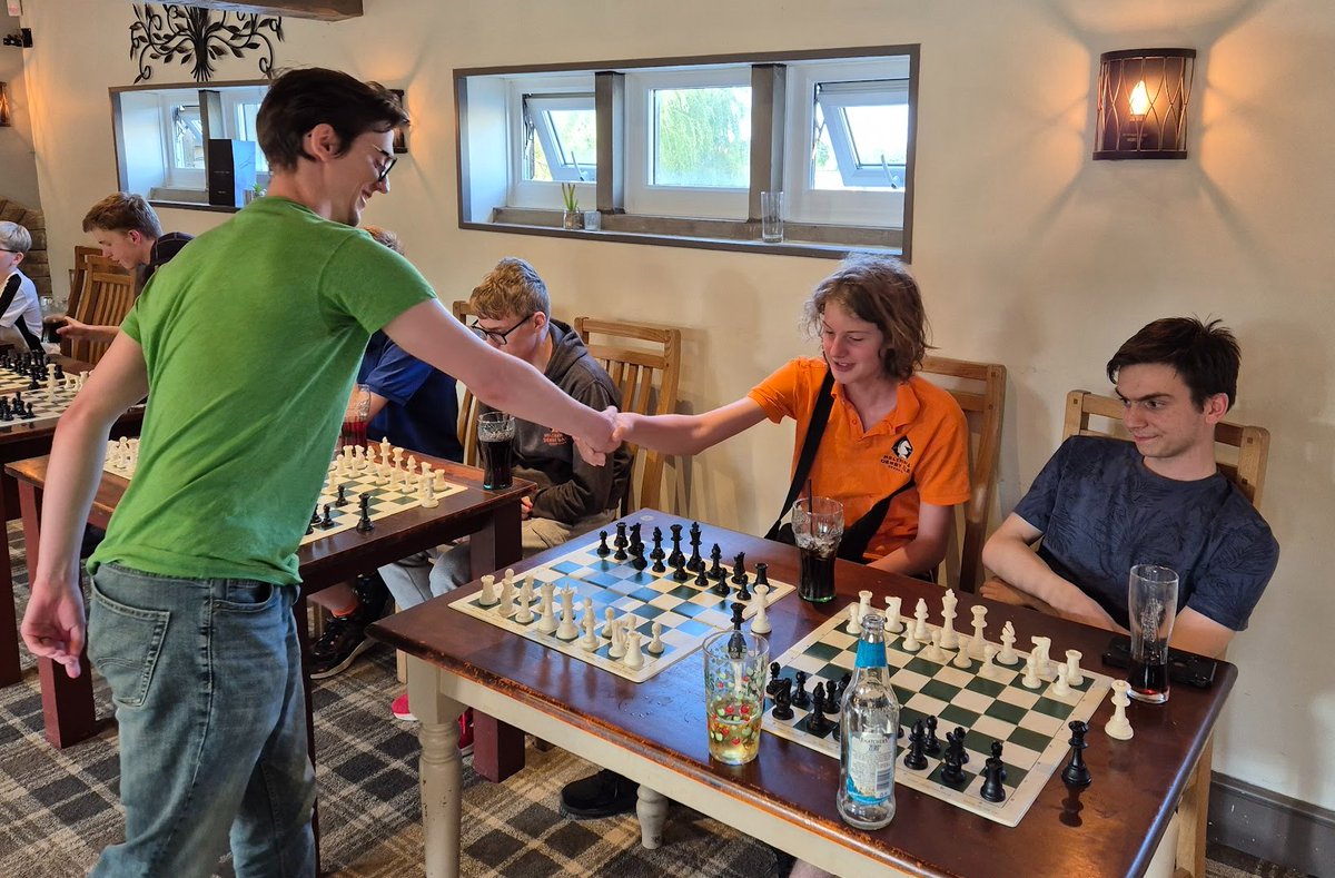 MaDDChess's tweet image. Last Thursday we hosted the formidable Greg Eagleton for a simul vs 20 players. He won 15-5, but well done to the four players of ours who scored wins against him! #chess