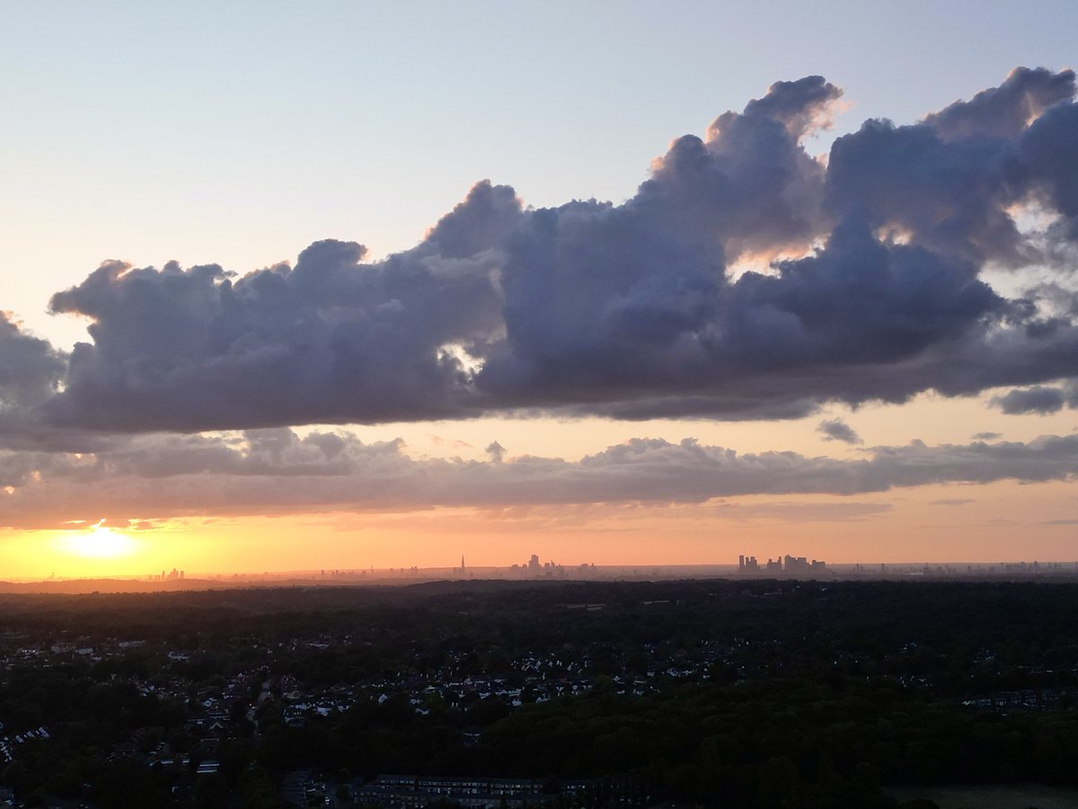 Most amazing storm clouds over London currently.  Lit up by the sunset.  Taken by drone at 400 feet. <a href="/TheSnowDreamer/">London & Southeast 🔆</a> <a href="/MetJam_/">MetJam</a> <a href="/metoffice/">Met Office</a> <a href="/Met4CastUK/">Met4Cast - UK Weather</a>