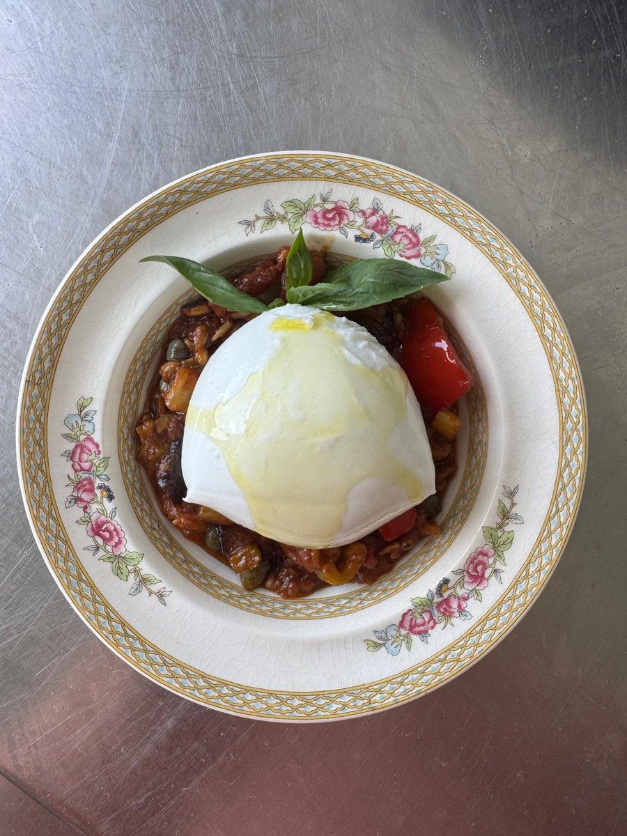 Creamy, fresh burrata with vibrant aubergine caponata.

#BurrataLove #AubergineCaponata #FigTreeFlavours #SummerMenu #CheeseAndVeggies #FarmToTable #FoodieDelight #StrawberryShortcakeEvents #WelshProduce #WeddingCateringGoals