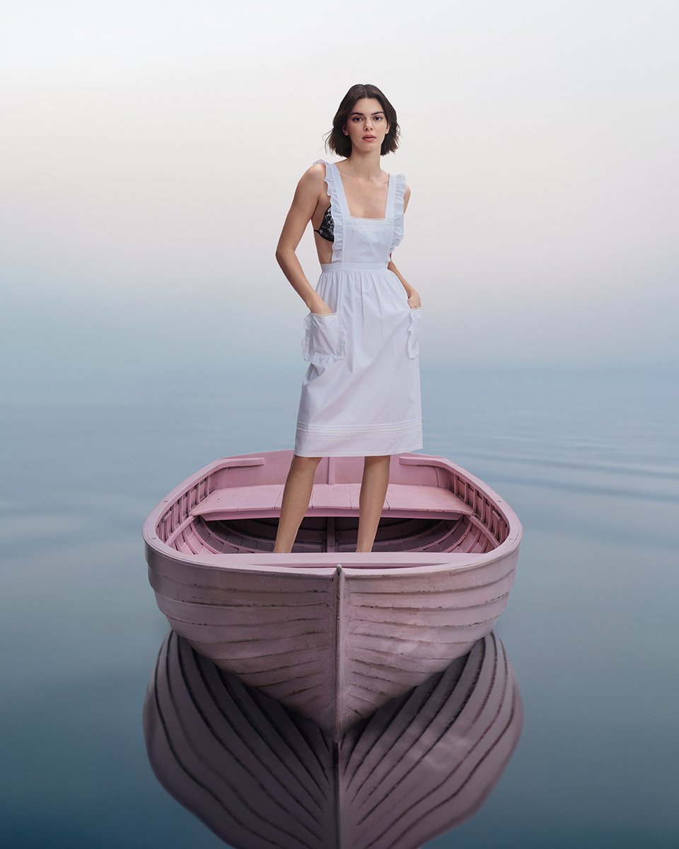 Prada's tweet image. Daydreaming. Kendall Jenner, starring in Prada’s “Days of Summer”.
Creative Directors: #MiucciaPrada and #RafSimons
Photography: Oliver Hadlee Pearch
Campaign Creative Direction: Ferdinando Verderi
#PradaSummer #Prada