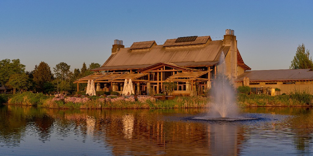 The iconic Riverway Clubhouse during golden hour. Along with incredible food and drinks, our clubhouses are perfect for weddings and special events.