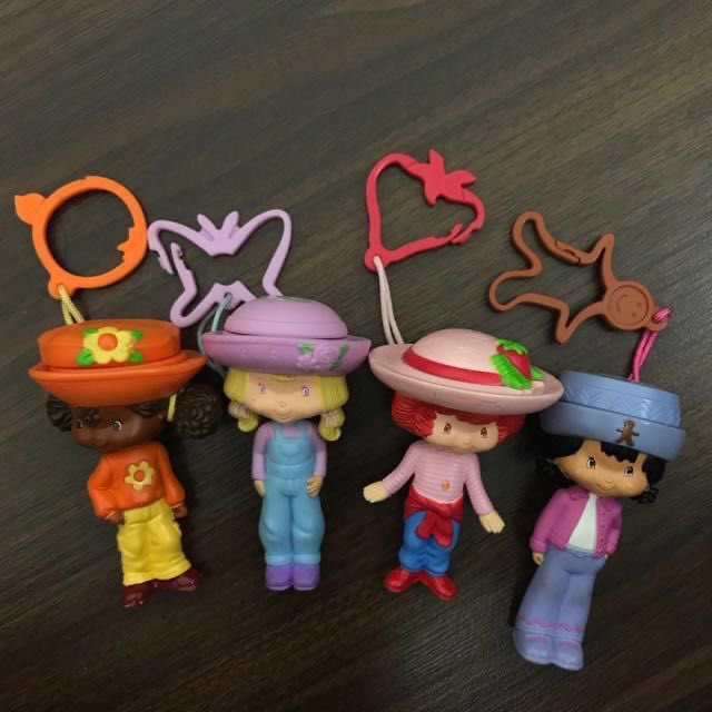 spoonieissmall's tweet photo. strawberry shortcake lip balm keychains from mcdonald’s 2005 !!!!! https://t.co/mnFqacqACb