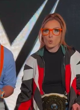 The orange glasses look so cute on her!!