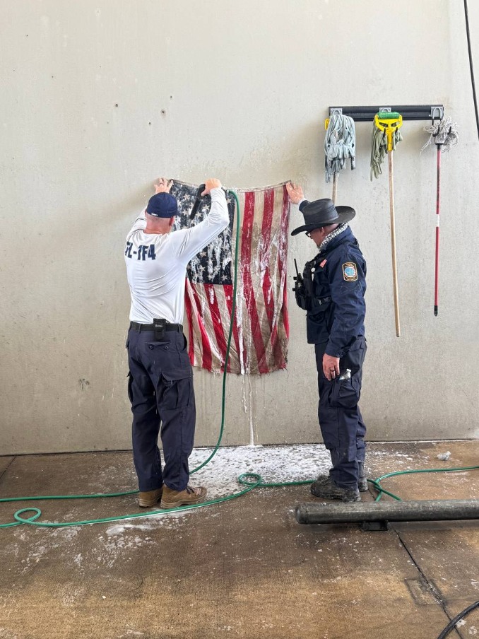 scfdpio's tweet image. Today in the Big Sandy Creek in Travis County Urban Search &amp;amp; Rescue Task Force 4  comprised of Seminole County FD, @OCFireRescue, @OrlandoFireDept found an American 🇺🇸 flag among the rubble. They are cleaning off Old Glory to fly again soon. #America #TexasStrong #TexasFloods